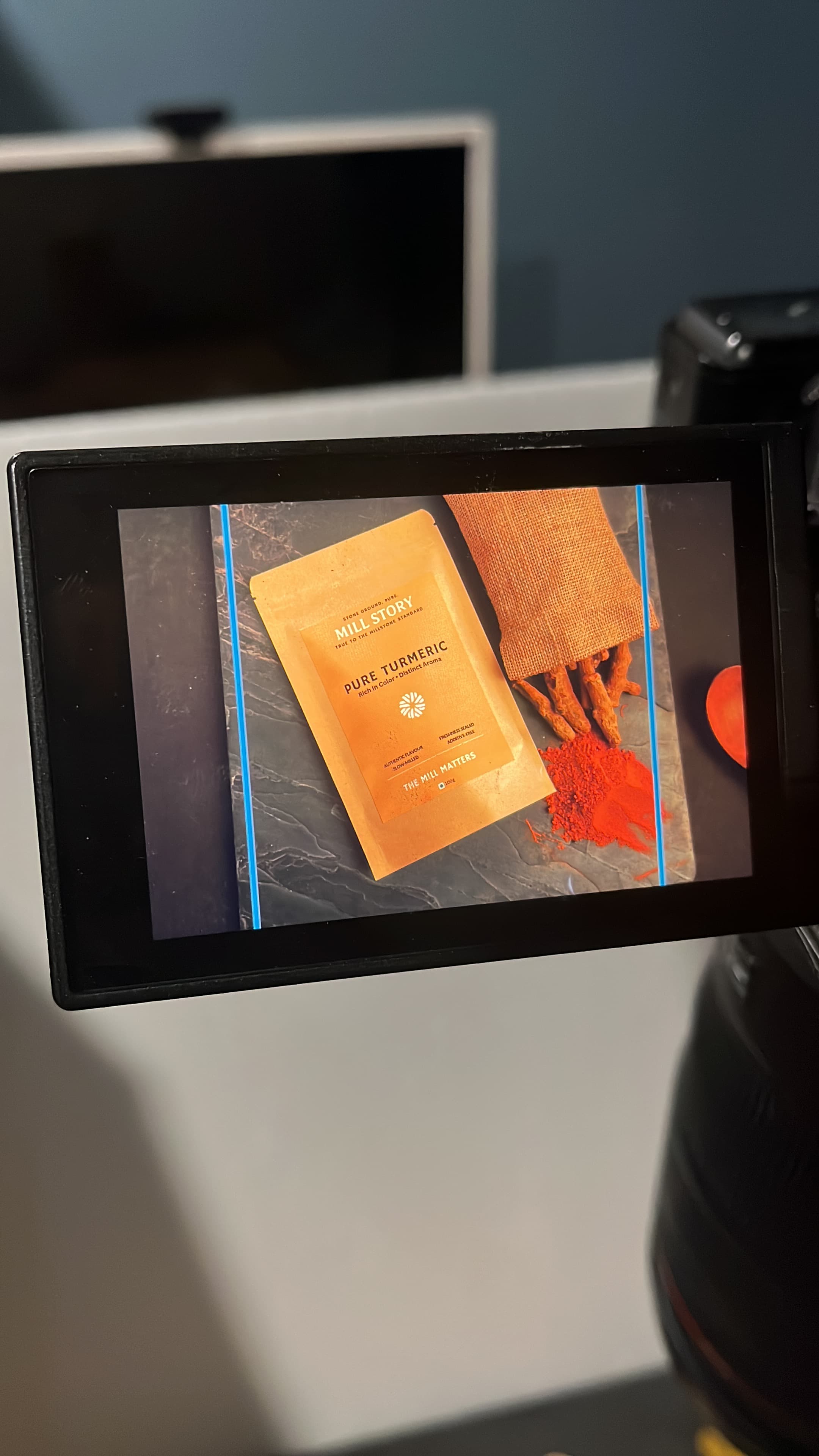 Mill Story turmeric packaging composition on the camera monitor